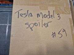 Spoiler (Box marked to fit a Tesla Model 3)