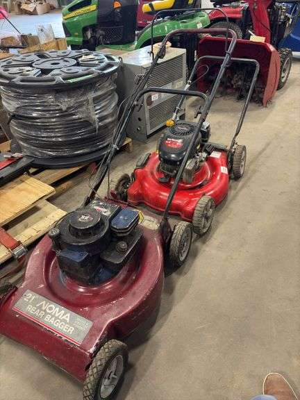 Two Push Lawn Mowers
