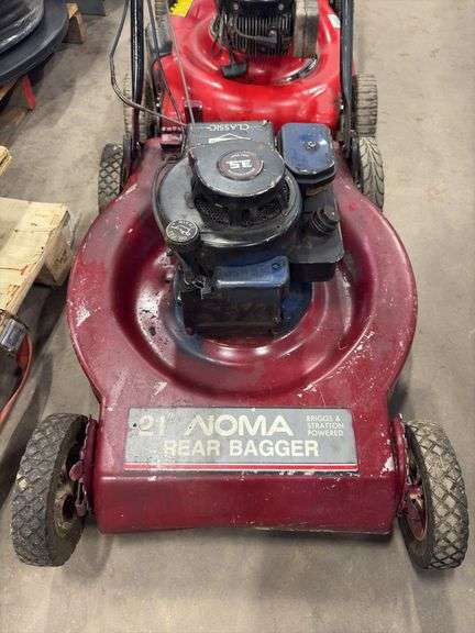 Two Push Lawn Mowers