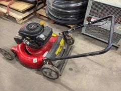 Two Push Lawn Mowers