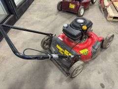 Two Push Lawn Mowers