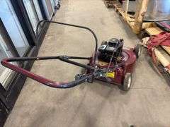 Two Push Lawn Mowers