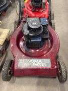 Two Push Lawn Mowers