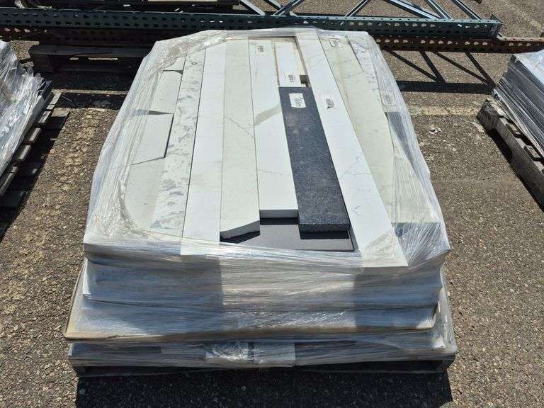 Pallet of Assorted Granite Slabs of Varying Shapes, Sizes and Colors