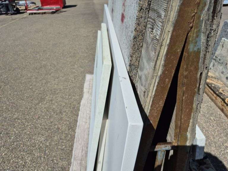 4 Slabs of Granite of Various Shapes, Sizes, and Colors (See Pictures)