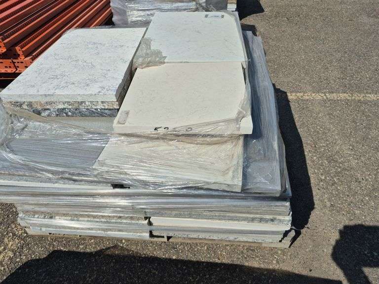Pallet of Assorted Granite Slabs of Varying Shapes, Sizes and Colors