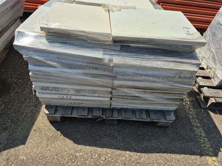 Pallet of Assorted Granite Slabs of Varying Shapes, Sizes and Colors