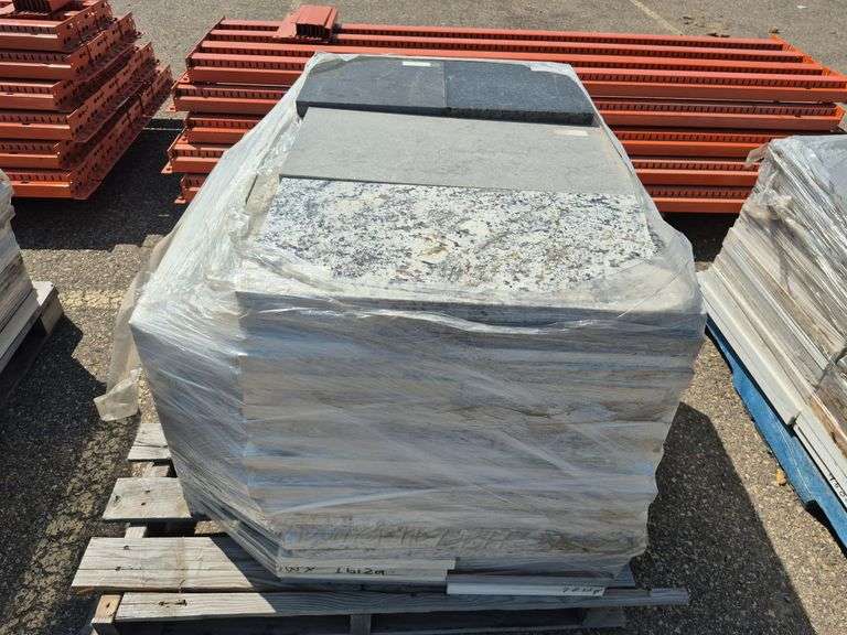 Pallet of Assorted Granite Slabs of Varying Shapes, Sizes and Colors