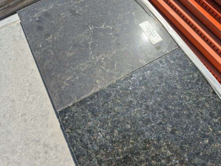 Pallet of Assorted Granite Slabs of Varying Shapes, Sizes and Colors