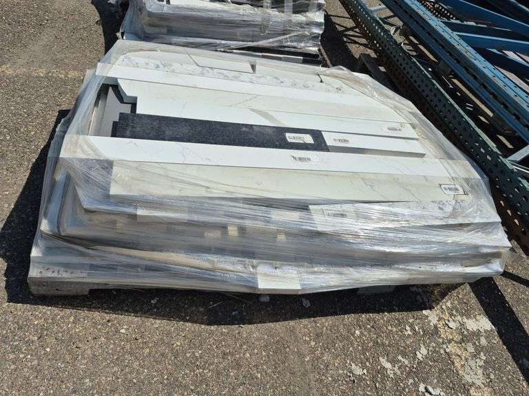 Pallet of Assorted Granite Slabs of Varying Shapes, Sizes and Colors