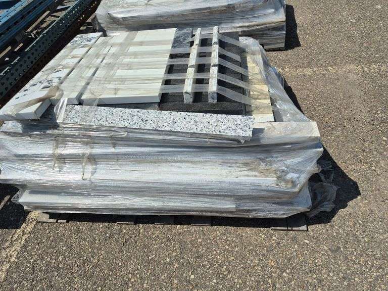 Pallet of Assorted Granite Slabs of Varying Shapes, Sizes and Colors