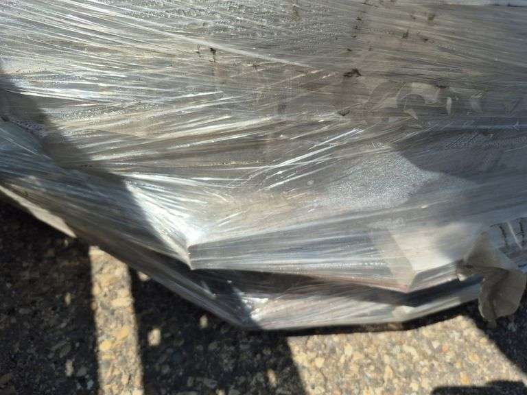 Pallet of Assorted Granite Slabs of Varying Shapes, Sizes and Colors