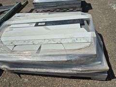 Pallet of Assorted Granite Slabs of Varying Shapes, Sizes and Colors