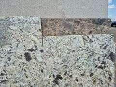 4 Slabs of Granite (Refer to Pictures)