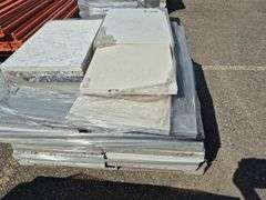 Pallet of Assorted Granite Slabs of Varying Shapes, Sizes and Colors