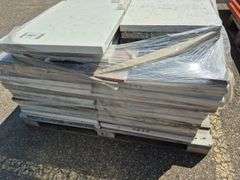 Pallet of Assorted Granite Slabs of Varying Shapes, Sizes and Colors