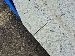 Slab of Granite (White with Beige/Grey/Black Speckling Pattern)