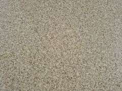 Slab of Granite (Beige with Light and Dark Brown and Grey Specked Pattern)