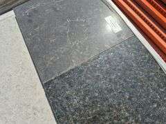 Pallet of Assorted Granite Slabs of Varying Shapes, Sizes and Colors