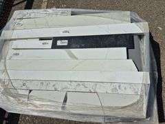 Pallet of Assorted Granite Slabs of Varying Shapes, Sizes and Colors