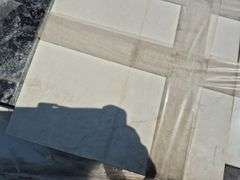 Pallet of Assorted Granite Slabs of Varying Shapes, Sizes and Colors