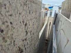 Slab of Granite Irregular Shape (White with Grey/Purple/Beige Speckled Pattern)