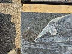 2 Slabs of Granite (Blackish in Color) (Both Approx. 39"L x 33"W)