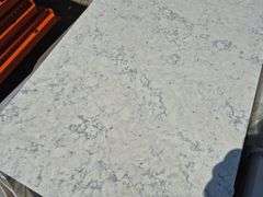 Pallet of Assorted Granite Slabs of Varying Shapes, Sizes and Colors