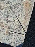 Slab of Granite Irregular Shape (White/Grey/Black/Beige Marbling Pattern)