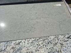 Pallet of Assorted Granite Slabs of Varying Shapes, Sizes and Colors