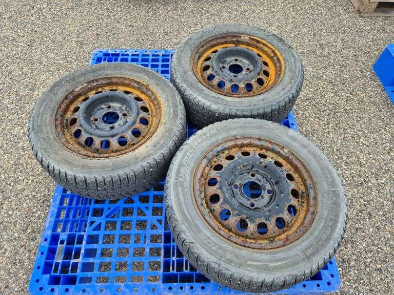 3 Michelin X-Ice Tires Mounted on Rims (185/65R15)