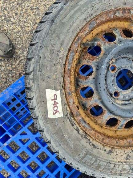 3 Michelin X-Ice Tires Mounted on Rims (185/65R15)