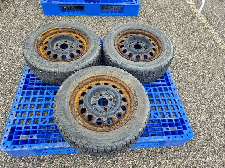 3 Michelin X-Ice Tires Mounted on Rims (185/65R15)