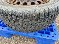 3 Michelin X-Ice Tires Mounted on Rims (185/65R15)