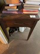 Assorted Books and Side Table
