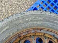 3 Michelin X-Ice Tires Mounted on Rims (185/65R15)