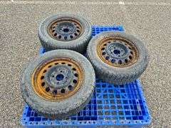 3 Michelin X-Ice Tires Mounted on Rims (185/65R15)