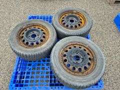 3 Michelin X-Ice Tires Mounted on Rims (185/65R15)