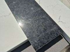 Pallet of Assorted Granite Slabs of Varying Shapes, Sizes and Colors