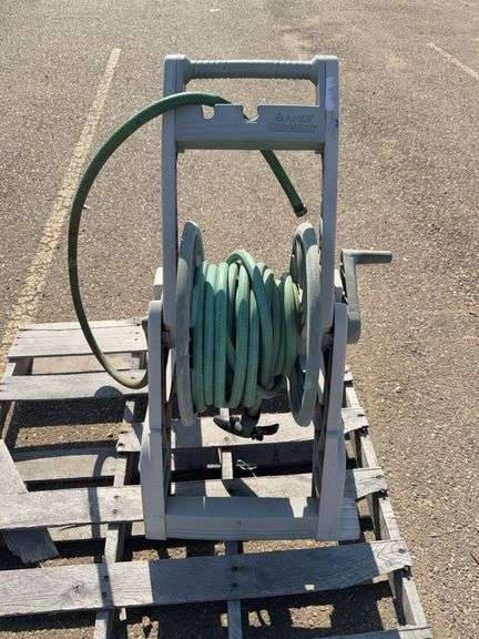 Ames ReelEasy Hose Reel Cart with a Garden Hose