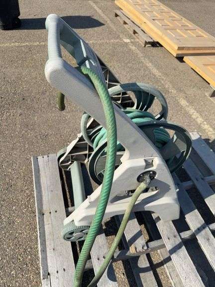 Ames ReelEasy Hose Reel Cart with a Garden Hose