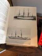 Assorted Books and Side Table