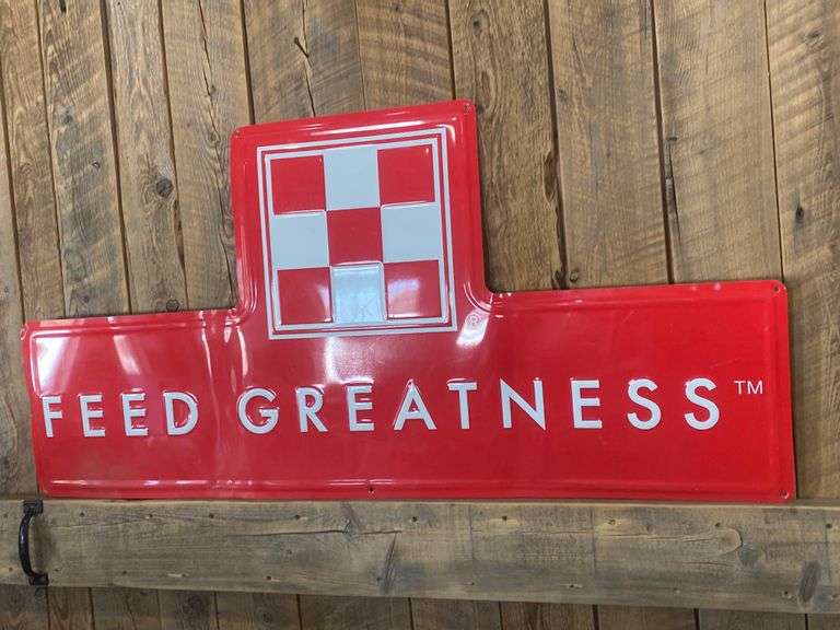 Feed Greatness tin sign