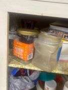 Tins, storage containers+ contents of cabinet