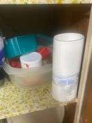 Tins, storage containers+ contents of cabinet