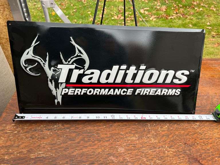 Metal Embossed Traditions Firearms Retailer Sign