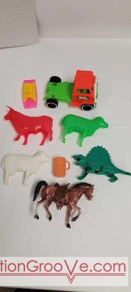 Assortment of vintage plastic toys. See photos.