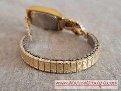 Women's 10 K Gold Watch. Black Hills Gold, Diamond Quartz. Needs new battery. Gold weight = 4.4 g.  
