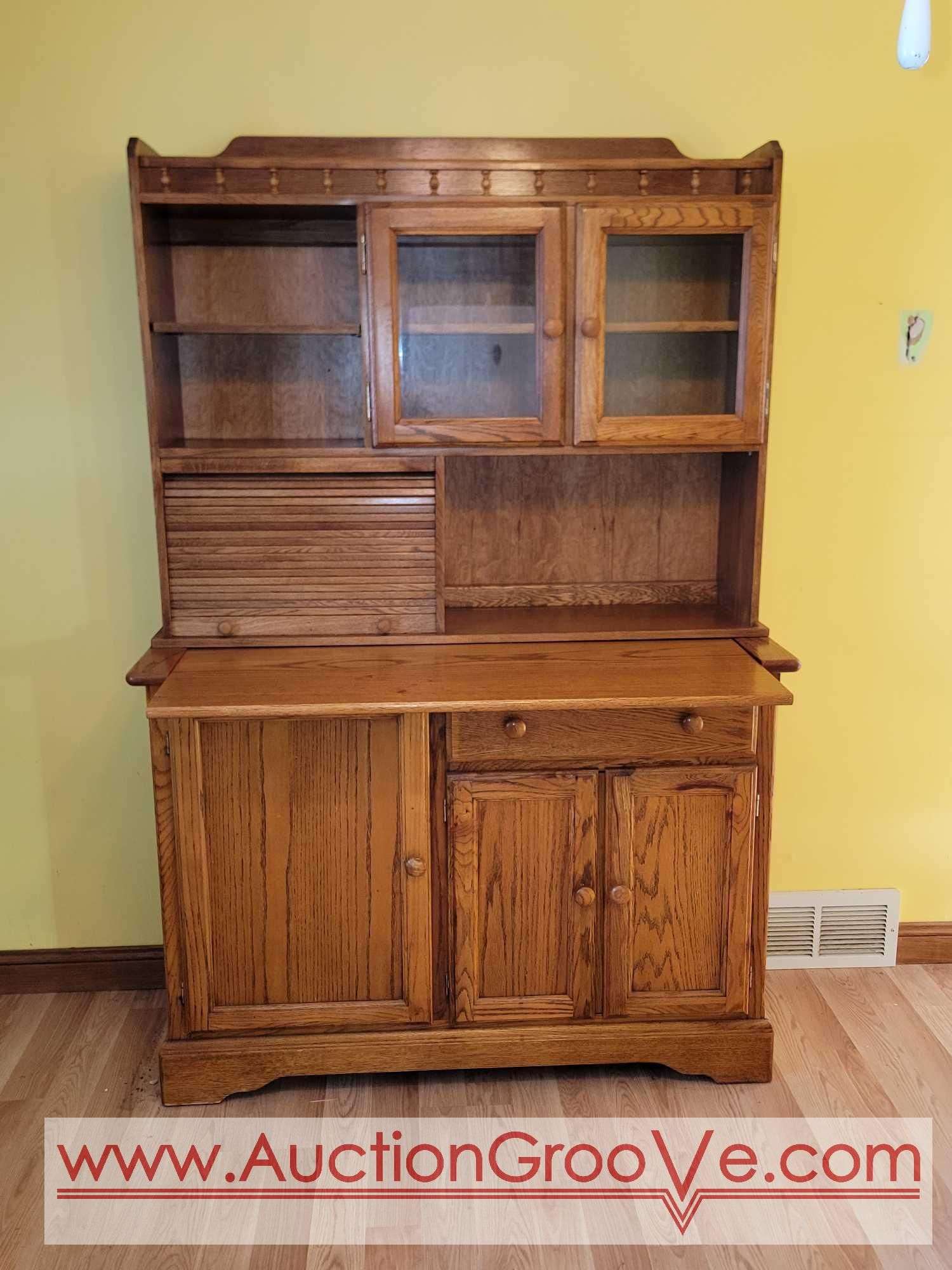 The Ashley Company Hoosier Cabinet. Has roll out conter top. 5 Door, one  Drawer and Bread Box. Top is removable. 50 x 20 x 74. With roll out 50 x 28  x, image size:1500x2000