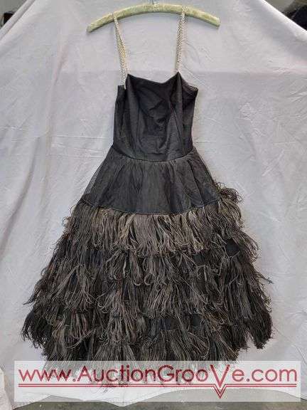 Vintage Ostrich Feather Dress with Photo of it in Action. Seems to be intact. Appears to be a size Small/Medium. CB